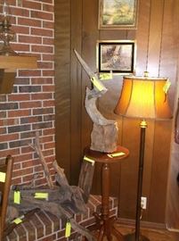 Driftwood pieces and one of several floor lamps