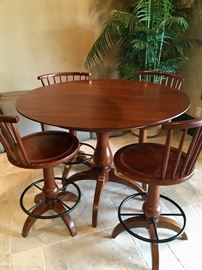 Tall bistro-style table (with leaf) with 6  swivel chairs 