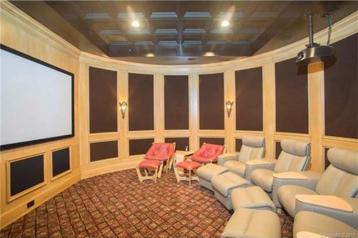 Home theater seating from Innbo Furniture ~ Stressless Legend 4 leather chairs & ottomans 
( originally $21,000)