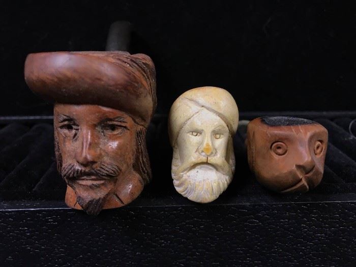074 Carved Head Pipes