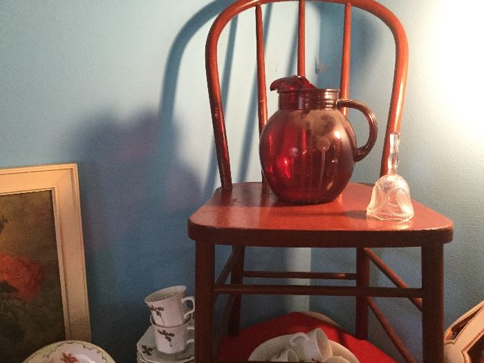 Bold red rare and red pitcher shows how diverse the items are at the sale.