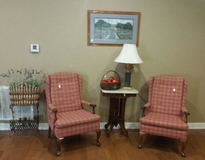 red/white Queen Anne small wingback chairs, marble top table, lamp