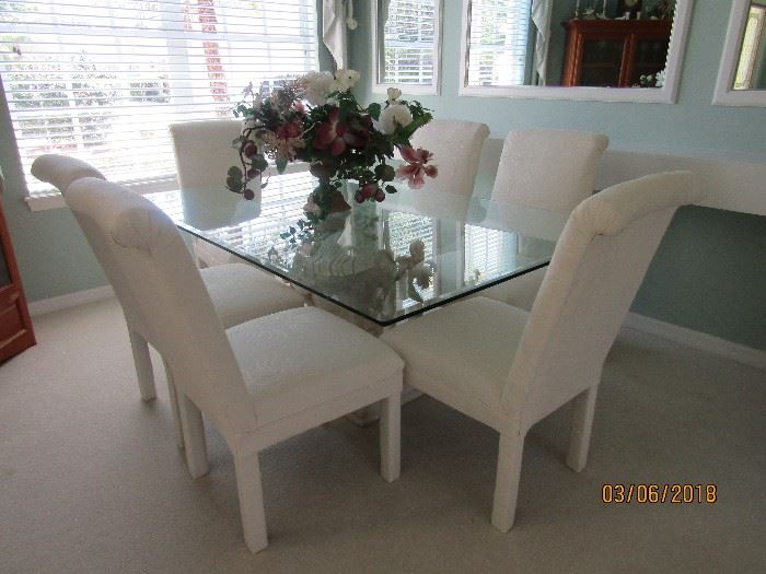 INCREDIBLE DINING SET.. 72" DOUBLE BEVEL GLASS TOP TABLE.. PALM TREE CONCRETE  BASE  AND ALSO THE 6 PARSONS CHAIRS.  EACH ITEM CAN BE SOLD SEPARATELY AND TOGETHER