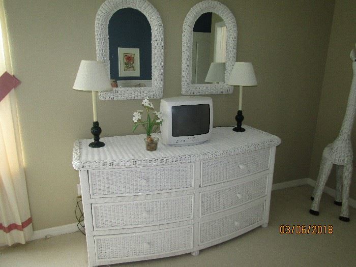 DOUBLE DRESSER WHITE WICKER WITH A UNIQUE BEVELED FRONT TO IT WITH 2 MATCHING MIRRORS.. REALLY UNIQUE