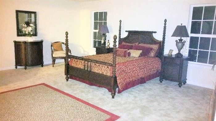 This master bedroom is very unusual.  4 poster barley twist headboard and footboard with matching pair of nightstands, commode cabinet with mirror, occasional chair, double dresser and round mirror, chaise and 7 ft tall floor mirror