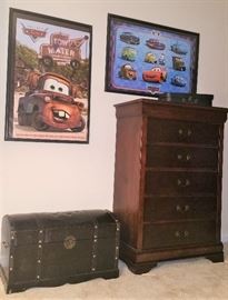 Bunk room - chest of drawers, black leather trunk and "CARS" accessories