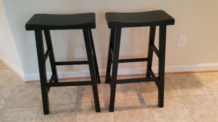 pair of black bar stools