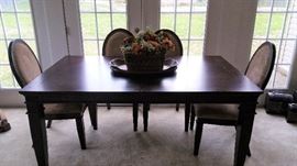 Large rectangular dining table wiht 4 matching chairs (has leaves)