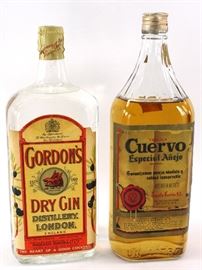 Bottles of Cuervo and Gordons