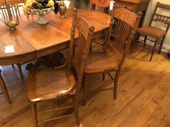 Set of Six American Oak Pressback Chairs with caned Seats circa 1900.  