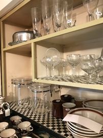 Assorted Glass Canisters And Glasses