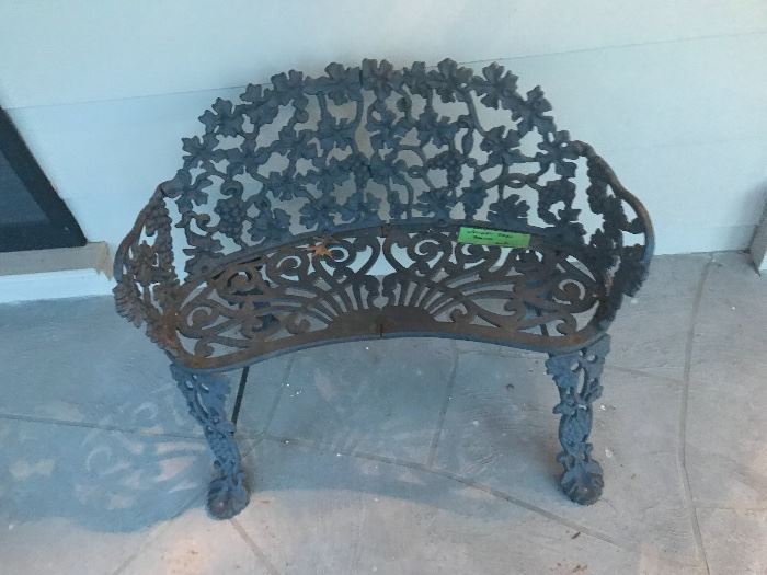 Wrought Iron Bench On Front Porch