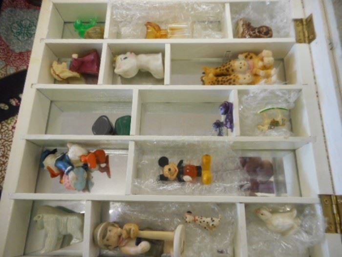 Shadowbox with plastic and porcelain miniatures