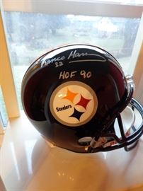 Franco Harris autographed Steeler's helmet.