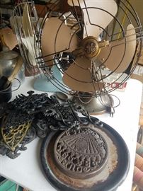 old fans and other primitive items in garage