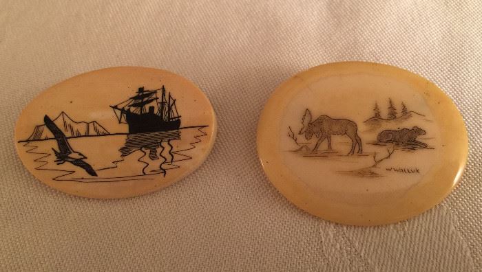 signed pair of Inuit ivory scrimshaw brooches