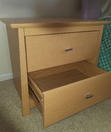 Light maple night stand with two drawers.  23.5" wide, 15.5" deep, 21" tall.