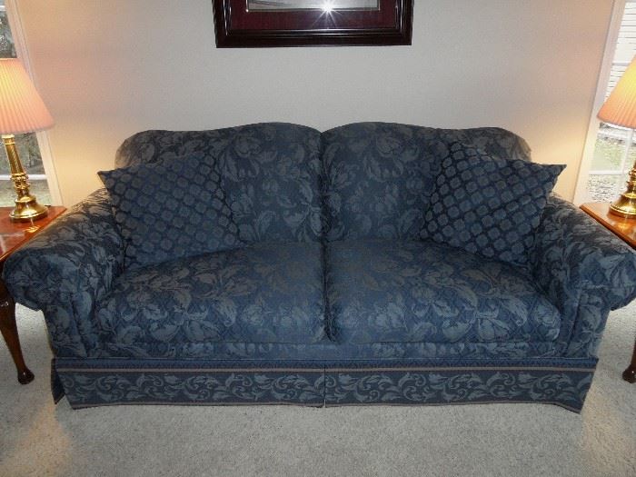 Top quality sofa by Rowe.  Blue damask fabric, skirted bottom, rolled arms with protectors.  Comes with coordinating throw pillows.  Great condition!  84" long x 36" deep.