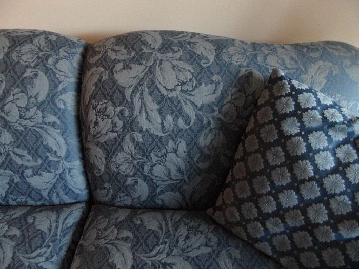 Top quality sofa by Rowe.  Blue damask fabric, skirted bottom, rolled arms with protectors.  Comes with coordinating throw pillows.  Great condition!  84" long x 36" deep.