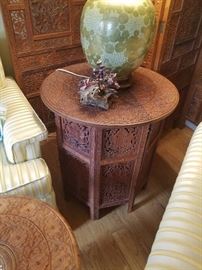 Carved wood tables
