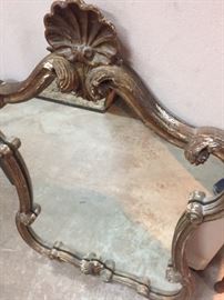 Antique mirror. It has seen some time but wears it's history well.