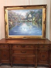 Striking, solid wood buffet. So handsome and in splendid condition. Original painting.
