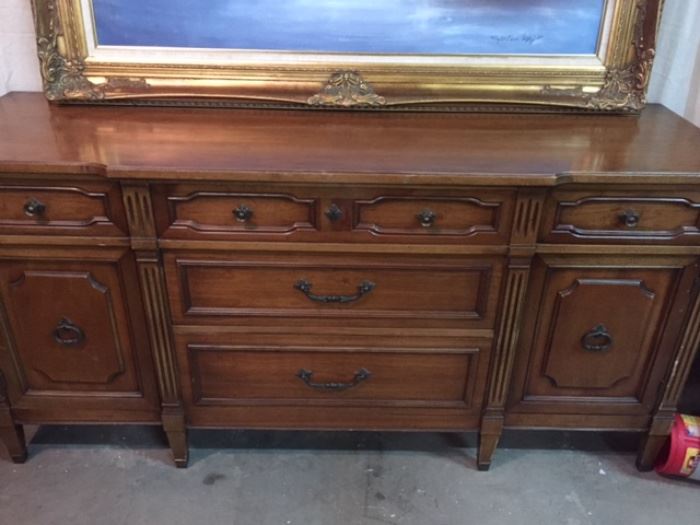 Although this handsome piece is a dresser, we think it would make a sensational buffet too. It has remarkable details and ample storage.