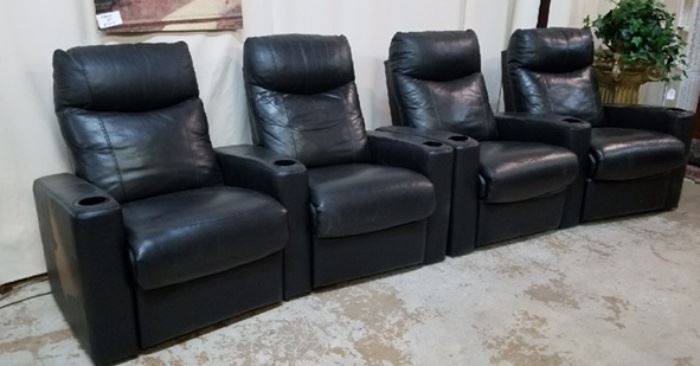 Solid black leather media room chair ensemble. Crazy comfy. 