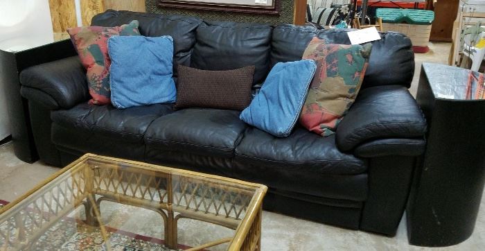 Man cave awesome! Solid leather (black) sofa with matching oversized chair and ottoman. Really nice condition.