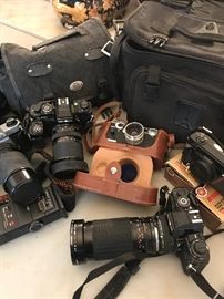 Assorted cameras.