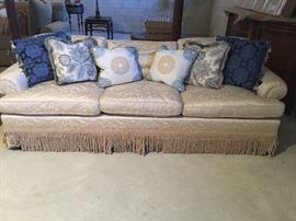 Custom upholstered silk sofa with accessory fring. Perfect condition. Barely used.
Interior designer custom made pillows sold separately.