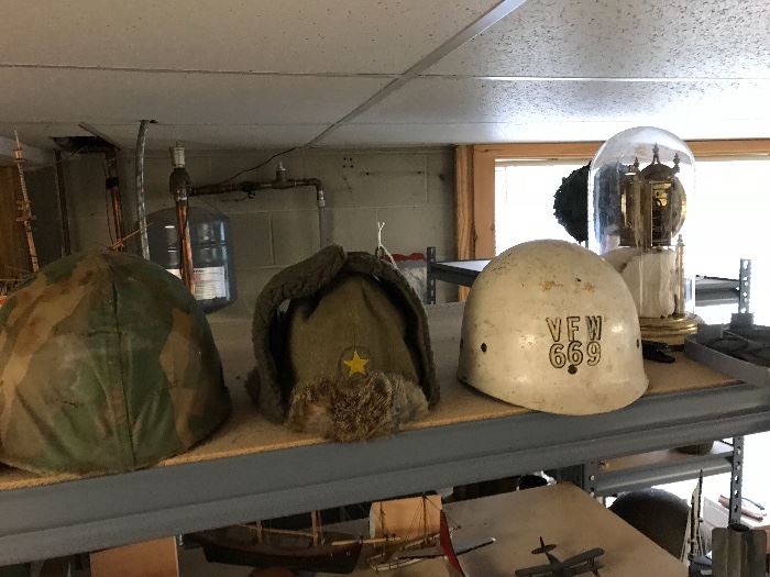 Dozens of authentic helmets and headgear from world War 2