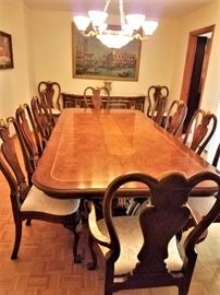 Gorgeous Kargas Dining set with 12 chairs (2 arm chairs, 10 side chairs).  Set cost is top of the line Kargas - in pristine condition.