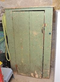 Love this primitive, beat up cupboard. 