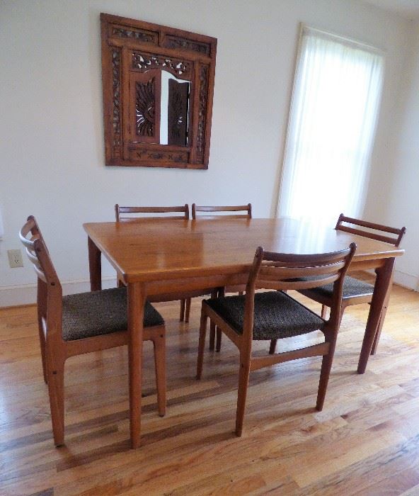 Mid Century Modern "Made in Denmark" teak dining table with 6 chairs. (1 "as is" )