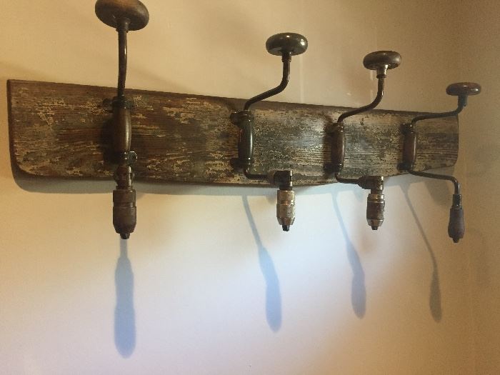 coat rack made of four antique hand turned drills--COOL!