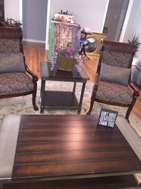 upholstered chairs and end table and coffee table