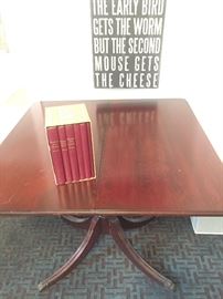 Fabulous flip top table and notice the complete early set of McGuffee Readers. 