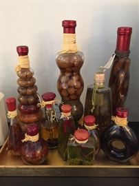 Olive oils in decorative bottles.