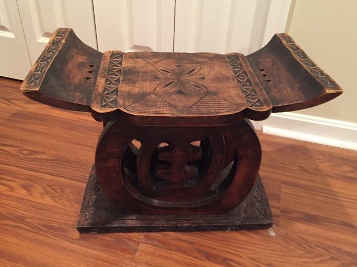 African wood seat.