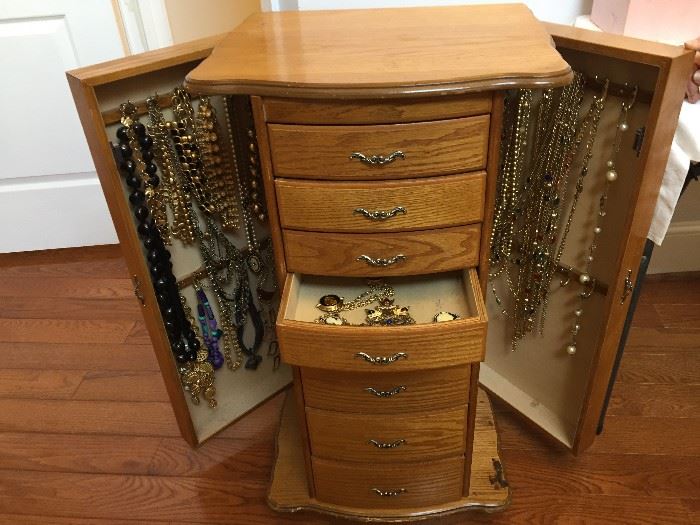 Jewelry box and large selection of costume jewelry.