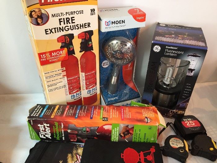 Fire extinguishers and other items new in box.