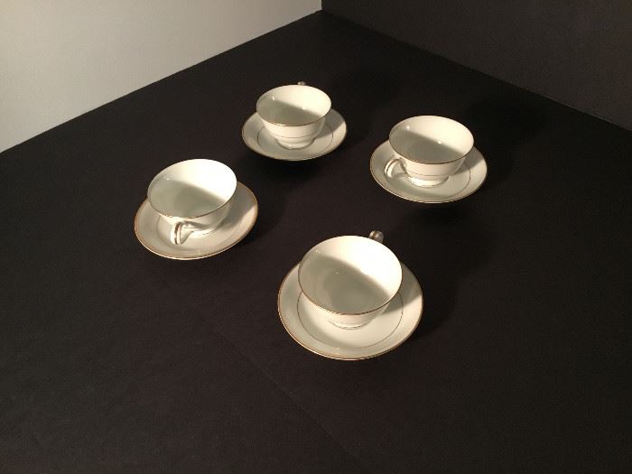 4 Cups and Saucers, White with Gold Trim  https://www.ctbids.com/#!/description/share/7874