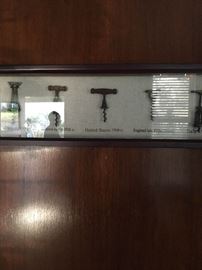 Display of antique corkscrews