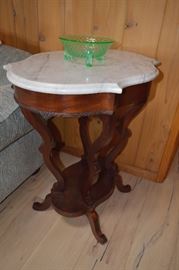 Dark wood ornate table with marble top