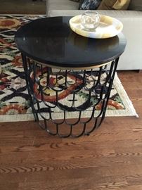Iron end table with marble top $285 24diameterx 23 high