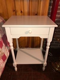 Small white side table, one drawer.