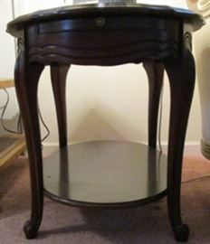 Matching side table to coffee table. This picture appears darker than the coffee table, but they are alike