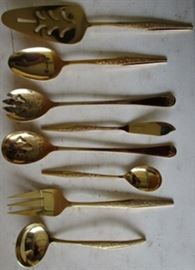 Serving pieces of a 54 Pc. Set of JH Gold Bouquet stainless.