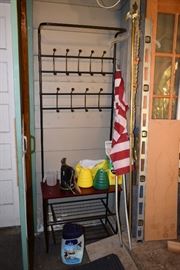 Coat hanger with shelves, flag, lawncare materials